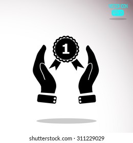 Hand holding badge