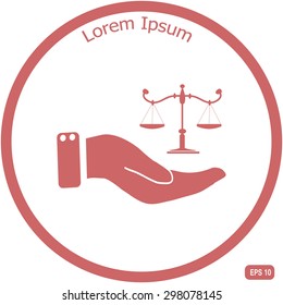 Hand holding balance