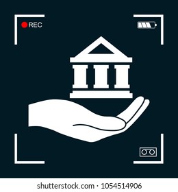 Hand holding bank