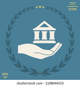 Hand holding bank