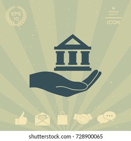 Hand holding bank