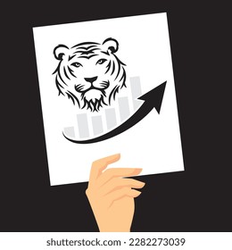 hand holding banner with business chart with tiger