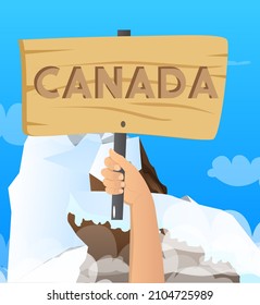 Hand holding banner with Canada text. Arms raised showing billboard. Commercial, Educational Sign.