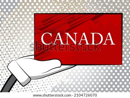 Hand holding banner with Canada text. Arms raised showing billboard. Commercial, Educational Sign.