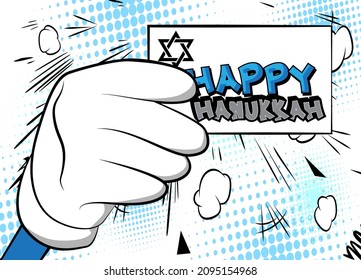 Hand holding banner with Happy Hanukkah text. Man showing billboard, sign. Holiday, celebration advertisement, announcement message.