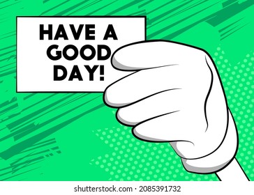 Hand holding banner with Have a good day! text on white paper. Man showing billboard.
