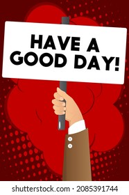 Hand holding banner with Have a good day! text on white paper. Man showing billboard.
