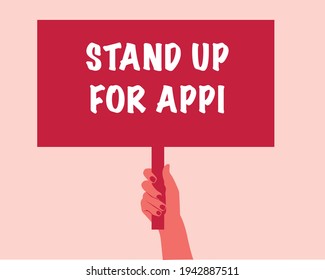 Hand holding a banner with a message: stand up for APPI. Vector