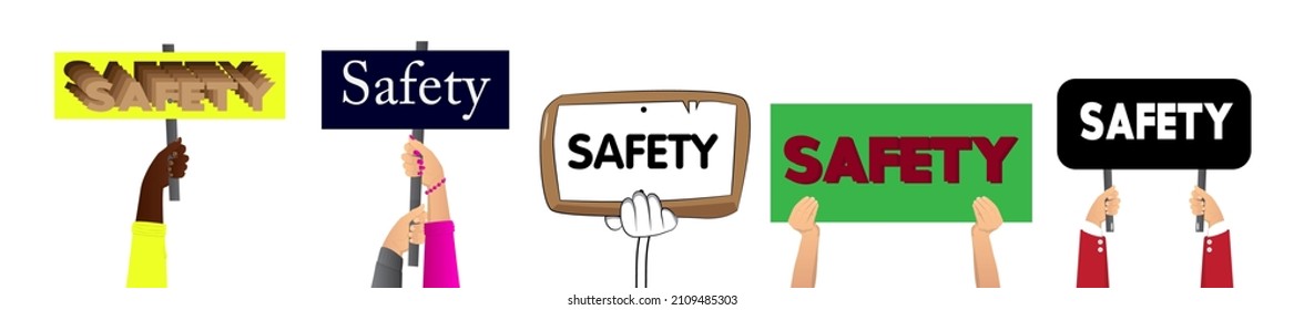 Hand holding up a banner with Safety text. Showing billboard banner, sign.