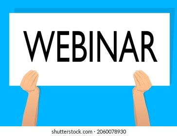 Hand holding banner with Webinar text on white paper. Man showing billboard.