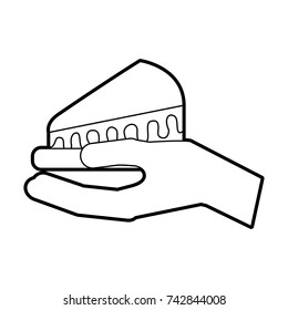 hand holding birthday cake slice food