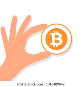 Moneda de la mano de la moneda de bitcoin. Imagen de vector aislada en fondo blanco