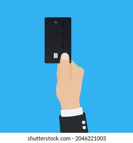 Hand holding black credit card. Finance transaction. Concept of wireless payment, online shopping, financial operation. Debit card with emv chip and contactless payment sign. Vector illustration