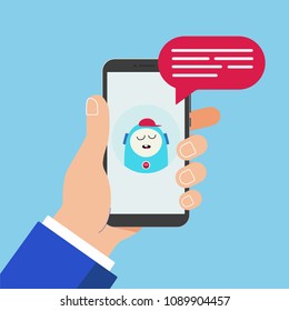 Hand holding black mobile phone isolated on blue background. Smartphone in human's hand with chat bot talk on the screen and popped above chat bubble flat design vector illustration. Chatting symbol.