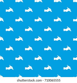 Hand holding black pen pattern repeat seamless in blue color for any design. Vector geometric illustration