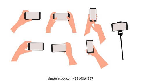 Hand holding the black smartphone with blank screen