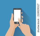 Hand holding black smartphone, touching blank white screen. Using mobile smart phone, flat design concept. Eps 10 vector illustration