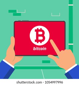 Hand holding black tablet device isolated on wall background. Pad tablet on human hands with bitcoin icon and index finger pointer touch the screen flat design vector illustration. Symbol mining sign.
