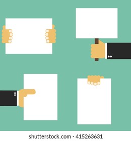 Hand holding blank paper 