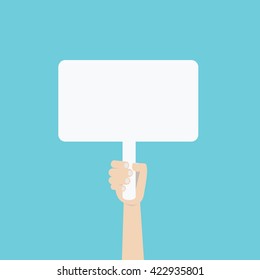 hand holding blank protest board