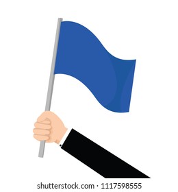 Hand holding blue flag concept.