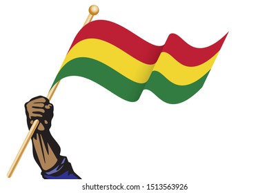 The hand holding the Bolivia flag.