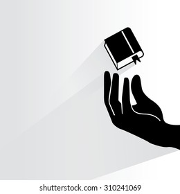 hand holding book on white background, flat and shadow theme