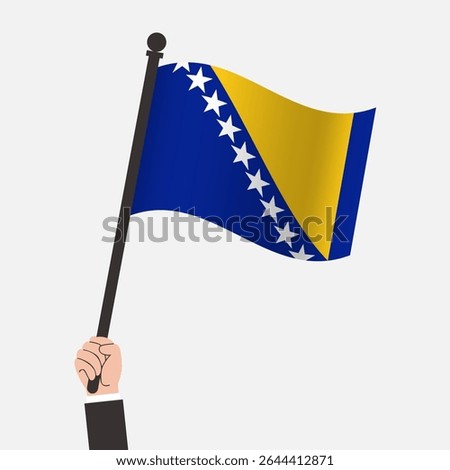 Hand Holding Bosnia and Herzegovina Waving Flag