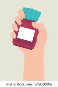 Hand holding a bottle