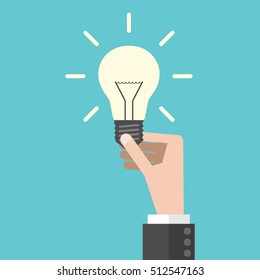 Hand holding bright shining light bulb. Innovation, insight and tip concept. Flat design. EPS 8 vector illustration, no transparency