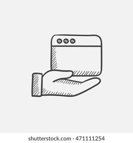 Hand holding browser window sketch icon for web, mobile and infographics. Hand drawn vector isolated icon.