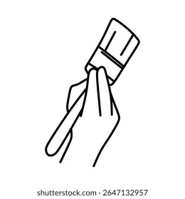 hand holding brush showing two fingers