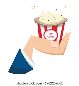Hand holding bucket of popcorn. Flat vector illustration in cartoon style isolated on white background.