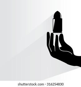 hand holding bullet