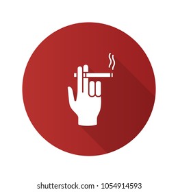 Hand holding burning cigarette flat design long shadow glyph icon. Smoker's hand. Vector silhouette illustration