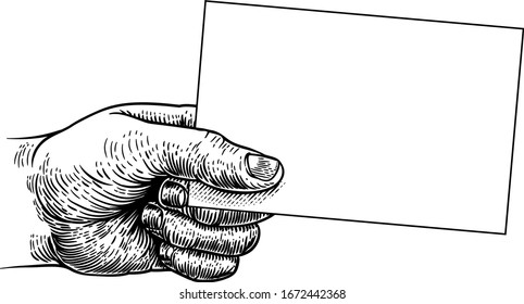 A hand holding business card flyer frame message sign and copyspace