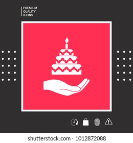 Hand holding a cake icon
