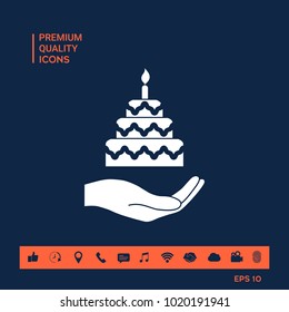 Hand holding a cake icon