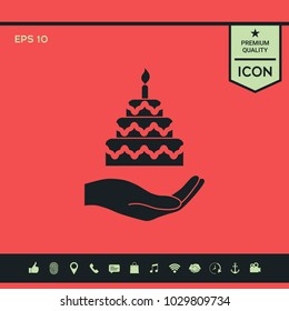 Hand holding a cake icon