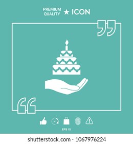 Hand holding a cake icon