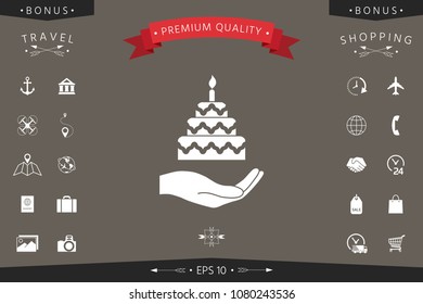 Hand holding a cake icon