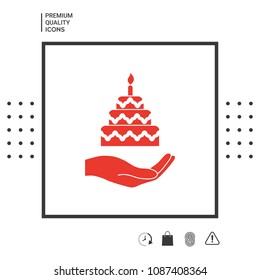 Hand holding a cake icon