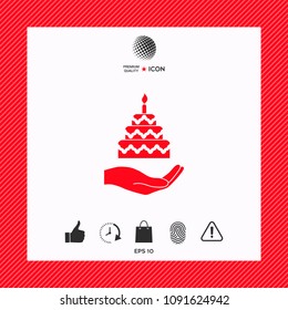 Hand holding a cake icon
