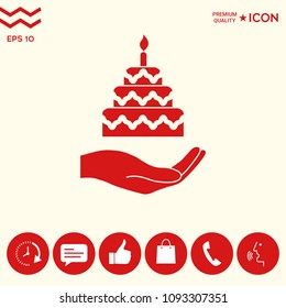 Hand holding a cake icon