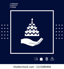Hand holding a cake icon