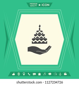 Hand holding a cake icon