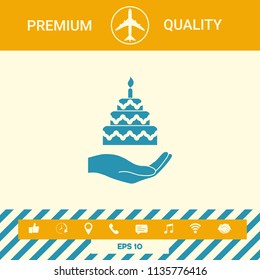 Hand holding a cake icon