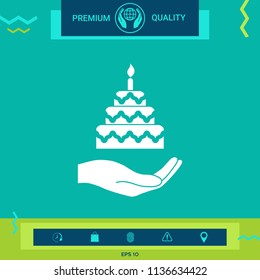 Hand holding a cake icon