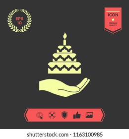 Hand holding a cake icon