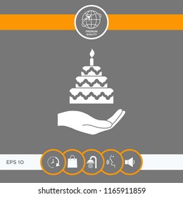 Hand holding a cake icon